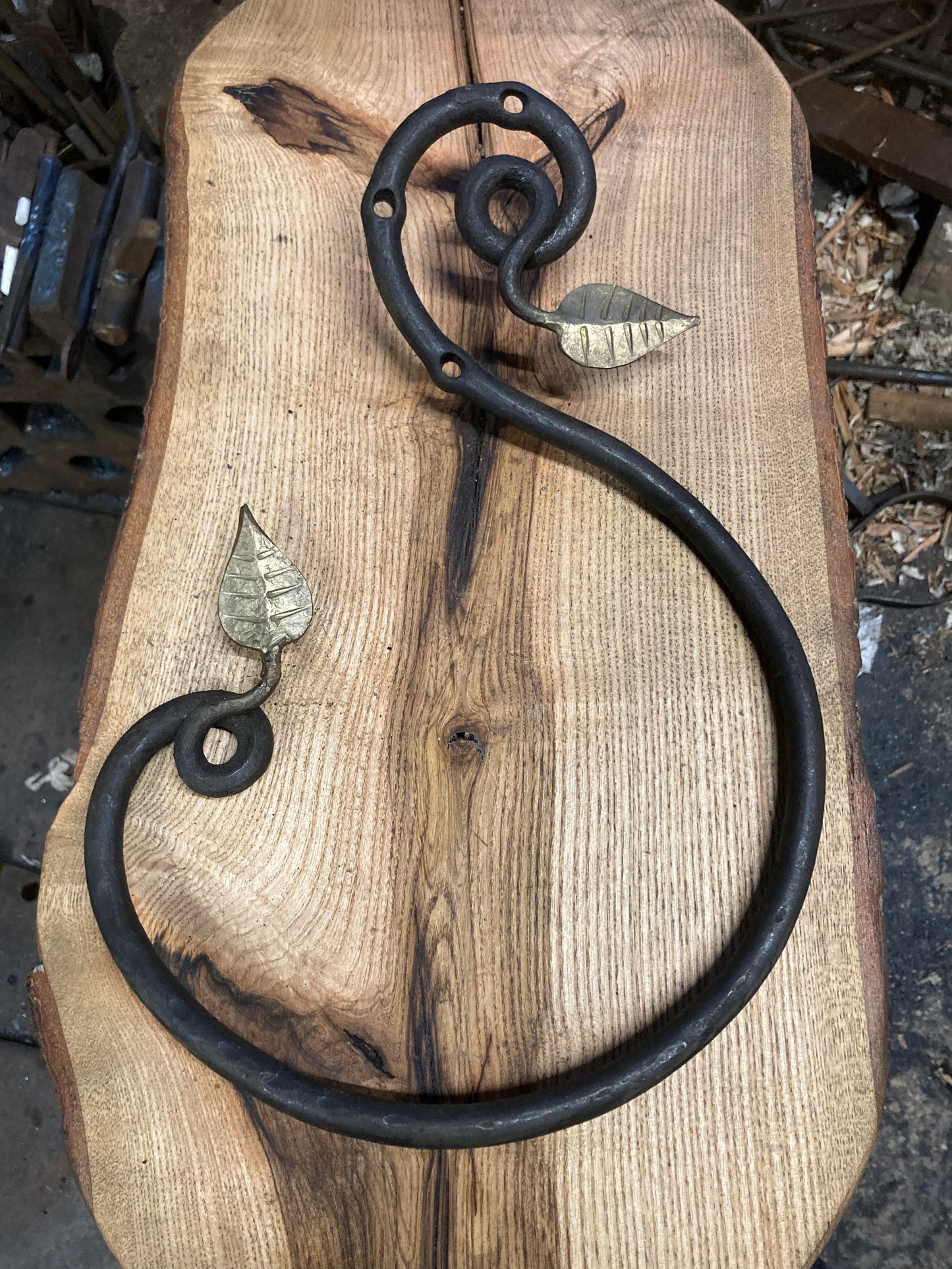 Hand Forged Towel Ring with brassed leaf design