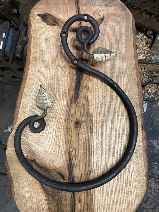 Hand Forged Towel Ring with brassed leaf design