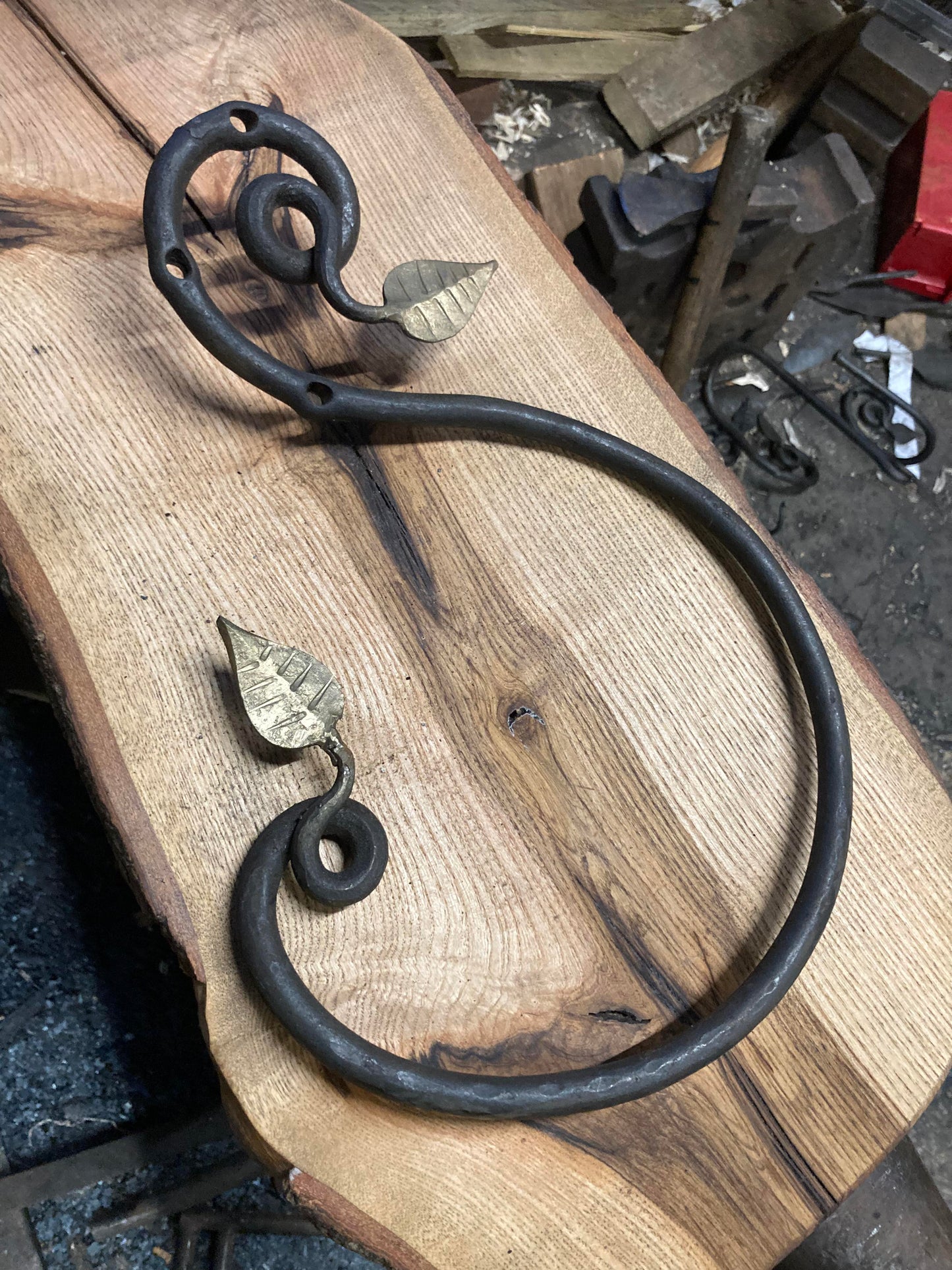 Hand Forged Towel Ring with brassed leaf design